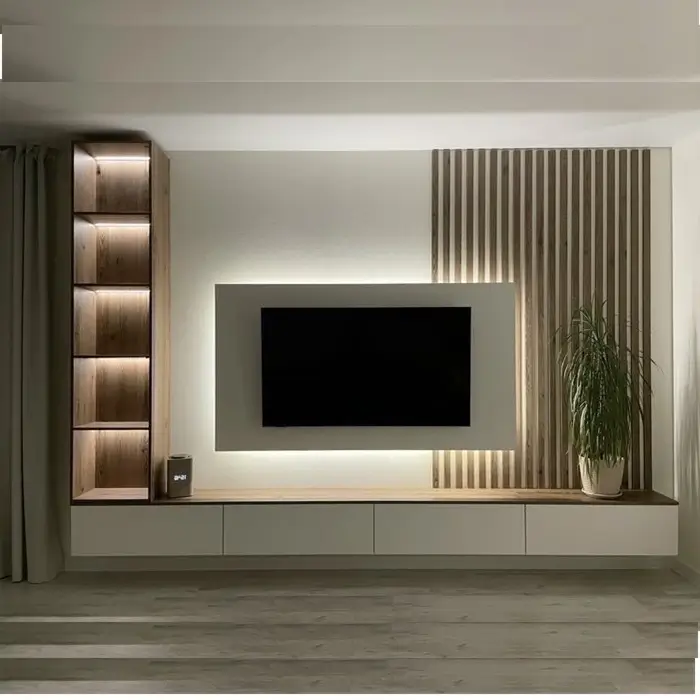 Premium entertainment wall with TV unit, ambient lighting, and display shelving in Jubilee Hills Hyderabad